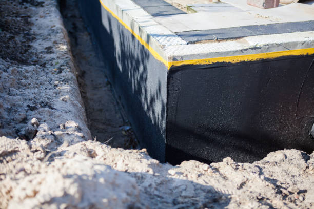 Professional Wet Basement Repair technician working in Columbia, MD